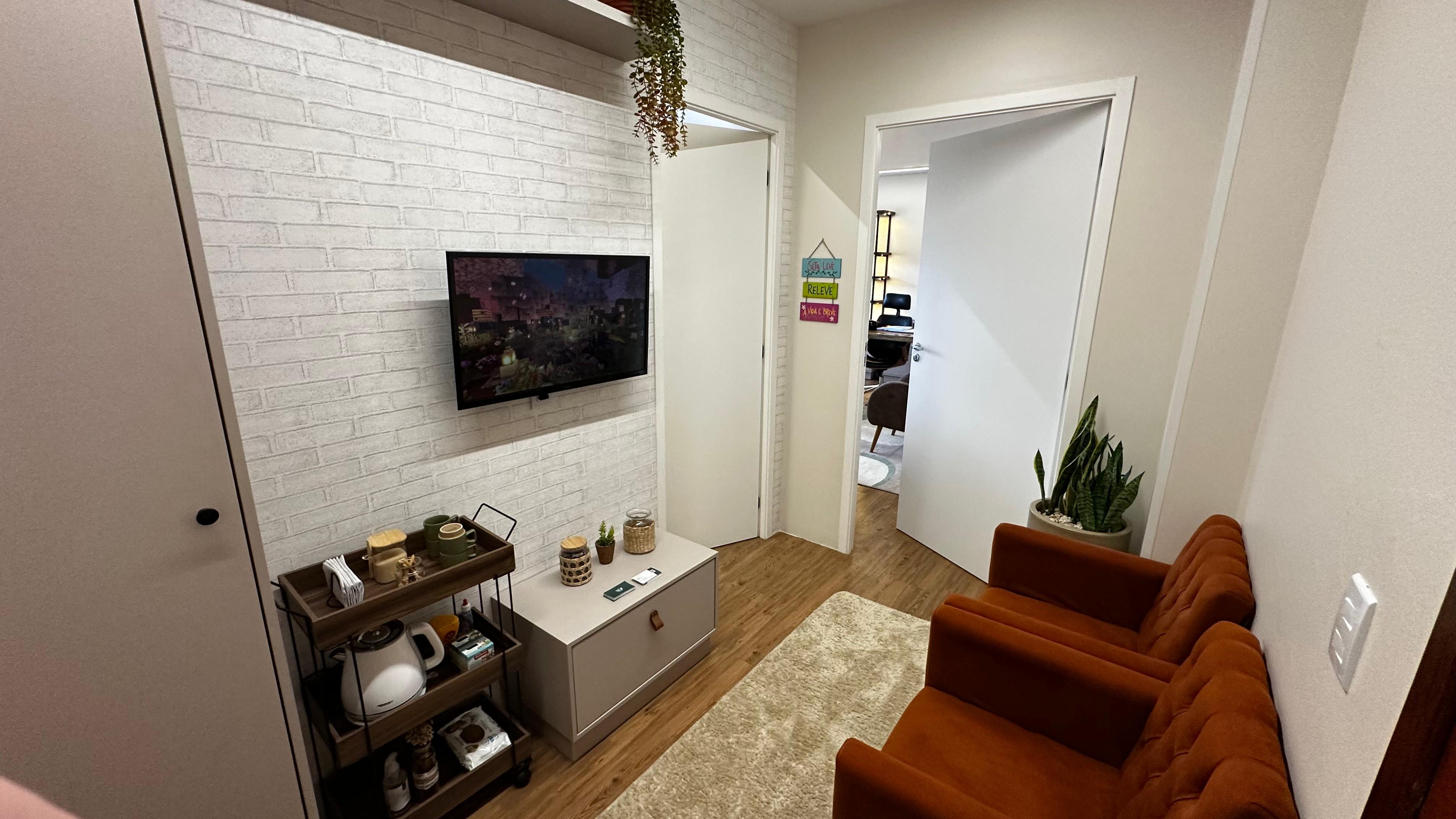 Foto da sala de espera do consultório